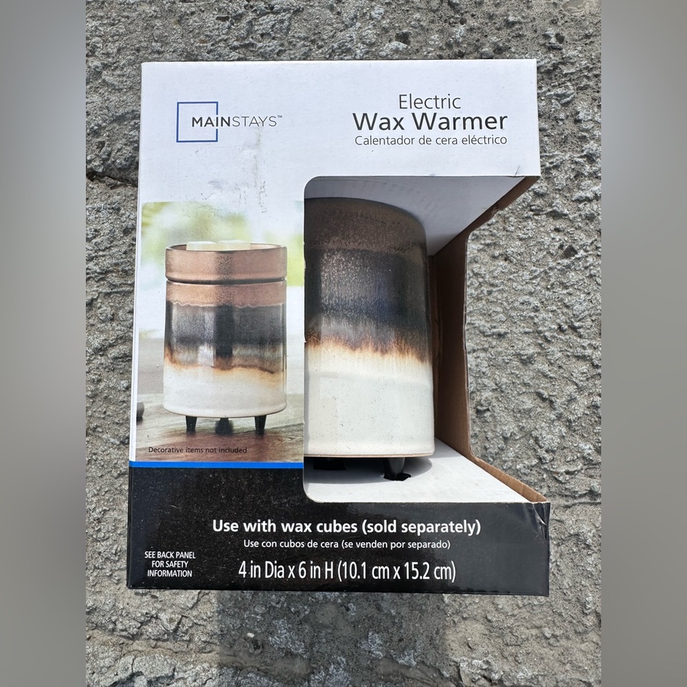 Mainstays Electric Wax Warmer brand new in the box.